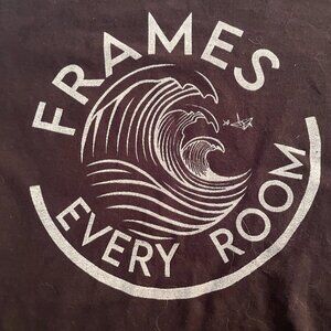 Frames Every Room t-shirt size small. It looks like the White Claw logo.